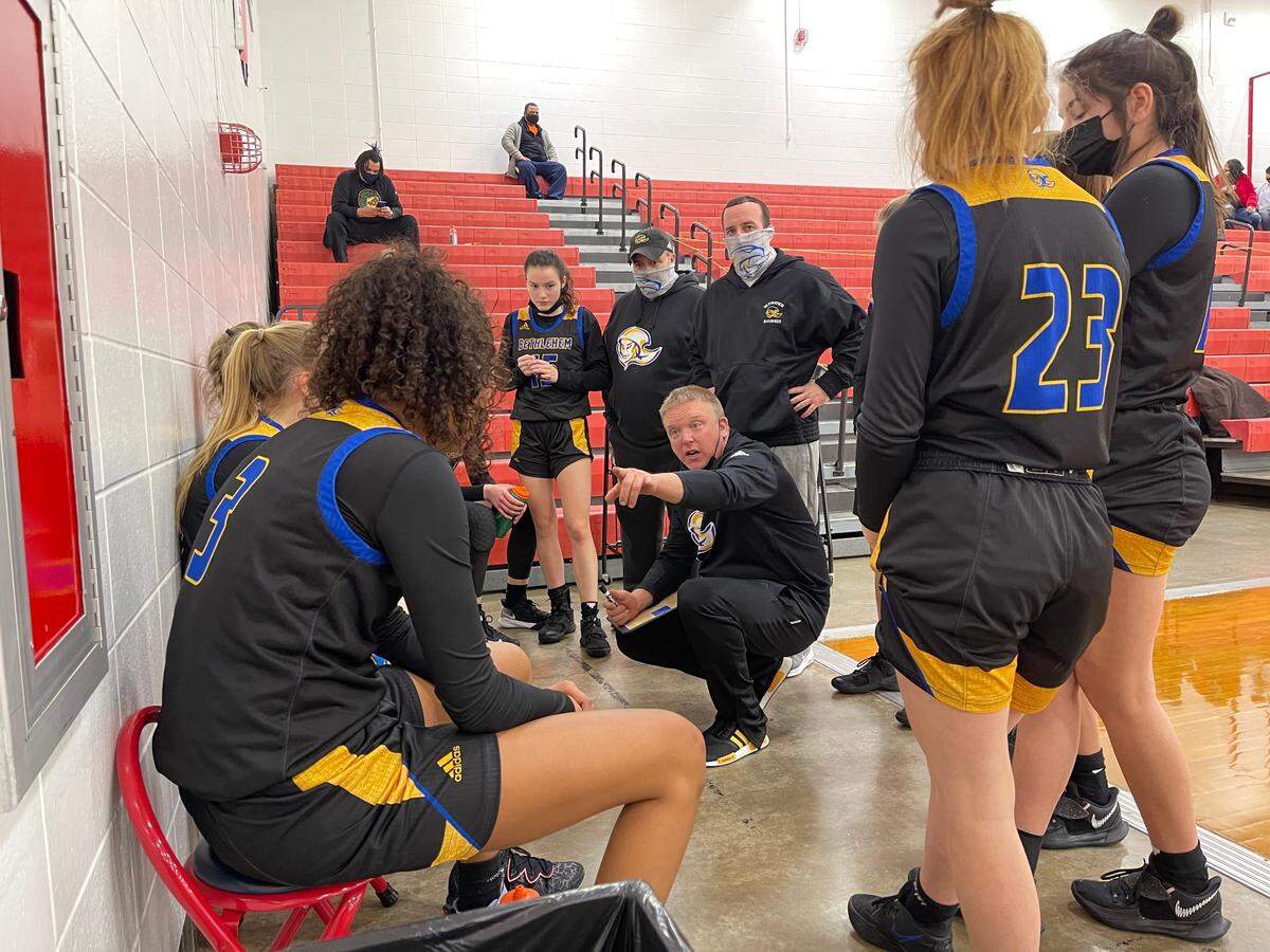 Bethlehem Coach Jason Clark delivers remarks during a break between periods in their game against Manual at Butler Traditional High School in Louisville in February. The Banshees won 66-61.