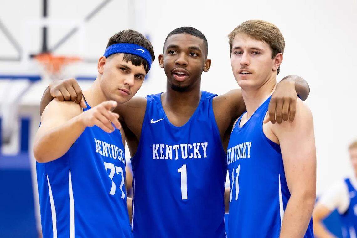 Kentucky guards Kerr Kriisa, left, Lamont Butler, middle, and Travis Perry huddle up during one of the team’s summer practices.