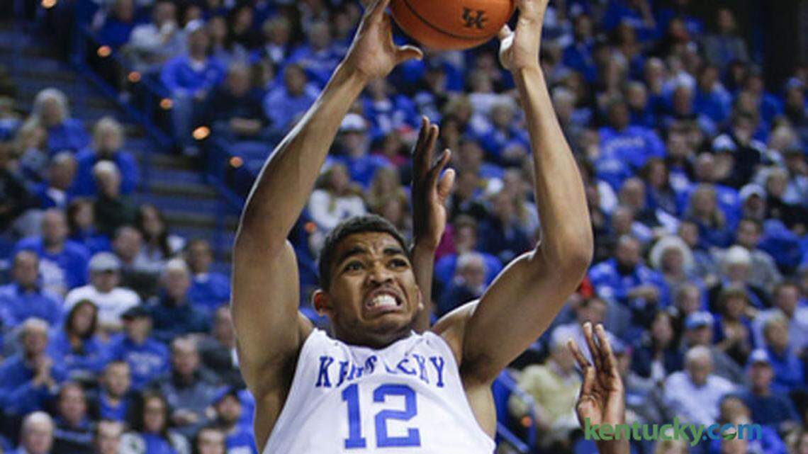 Kentucky Wildcats forward Karl-Anthony Towns (12) pulled down one of his 11 rebounds as Kentucky defeated Texas-Arlington 92-44 on Tuesday November 25, 2014 in Lexington, Ky.
