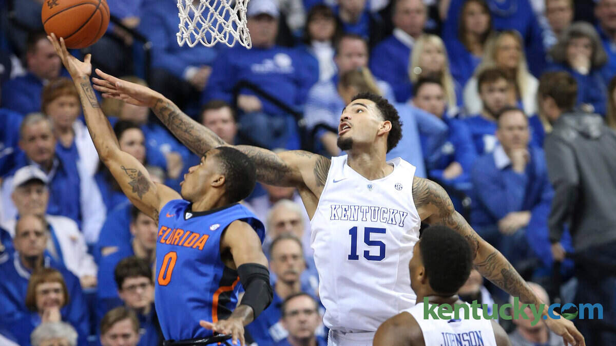 Florida Gators guard Kasey Hill (0) tries to get past Kentucky  Wildcats forward Willie Cauley-Stein (15) during the second half of  their game in Lexington, Ky., on Saturday, March 7, 2015. Kentucky  defeated Florida 67-50 to win their 31st game and finish the  regular season undefeated. Photo by David Stephenson