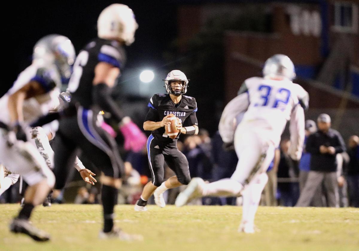 Lexington Christian quarterback Drew Nieves (12) scrambles to find a receiver during the Eagles’ win over Danville on Friday night.