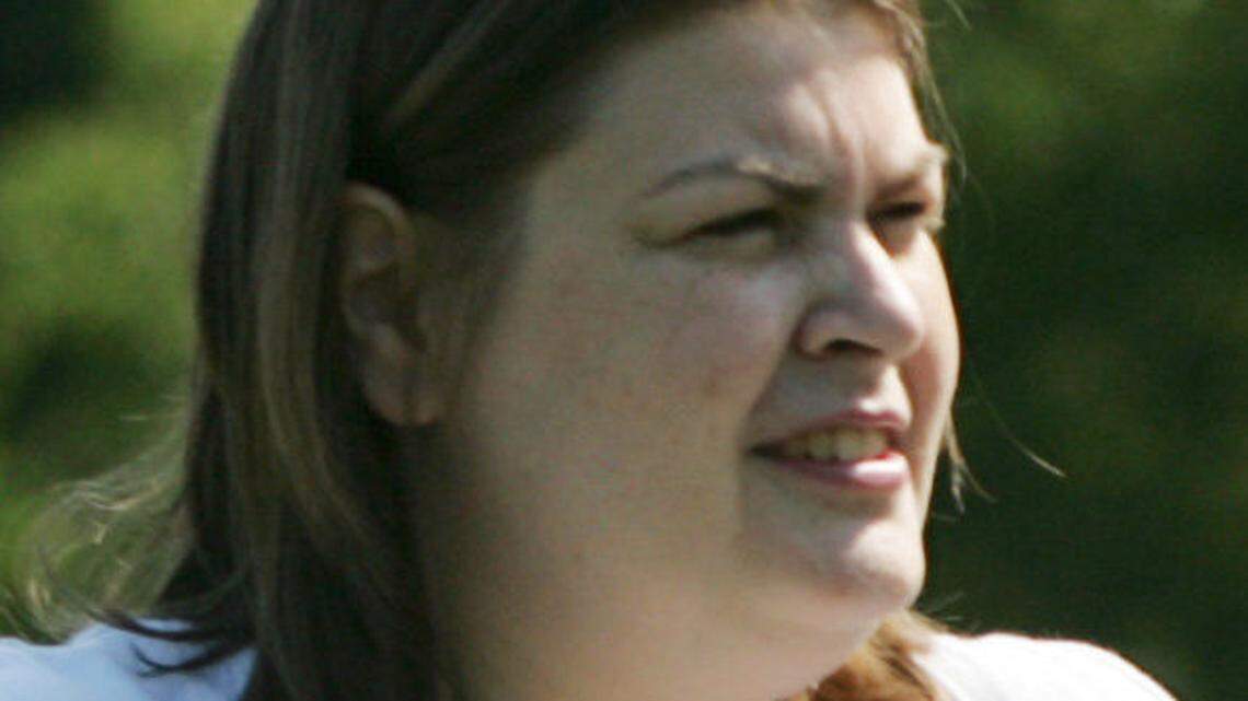  Andrea Earhart Stauter visited the grave of her brother, Ed Earhart, the Navy meterologist who was killed in the terrorist attack on the Pentagon on Sept. 11, 2001, at the family cemetery near Morehead, Ky., on Thursday, Sept. 7, 2006. David Stephenson/Staff