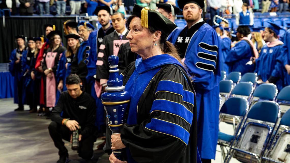 University Marshal leads the graduation processional, holding the traditional mace during the first of two UK graduation ceremonies at Central Bank Center on May 9, 2025, in Lexington, Ky.