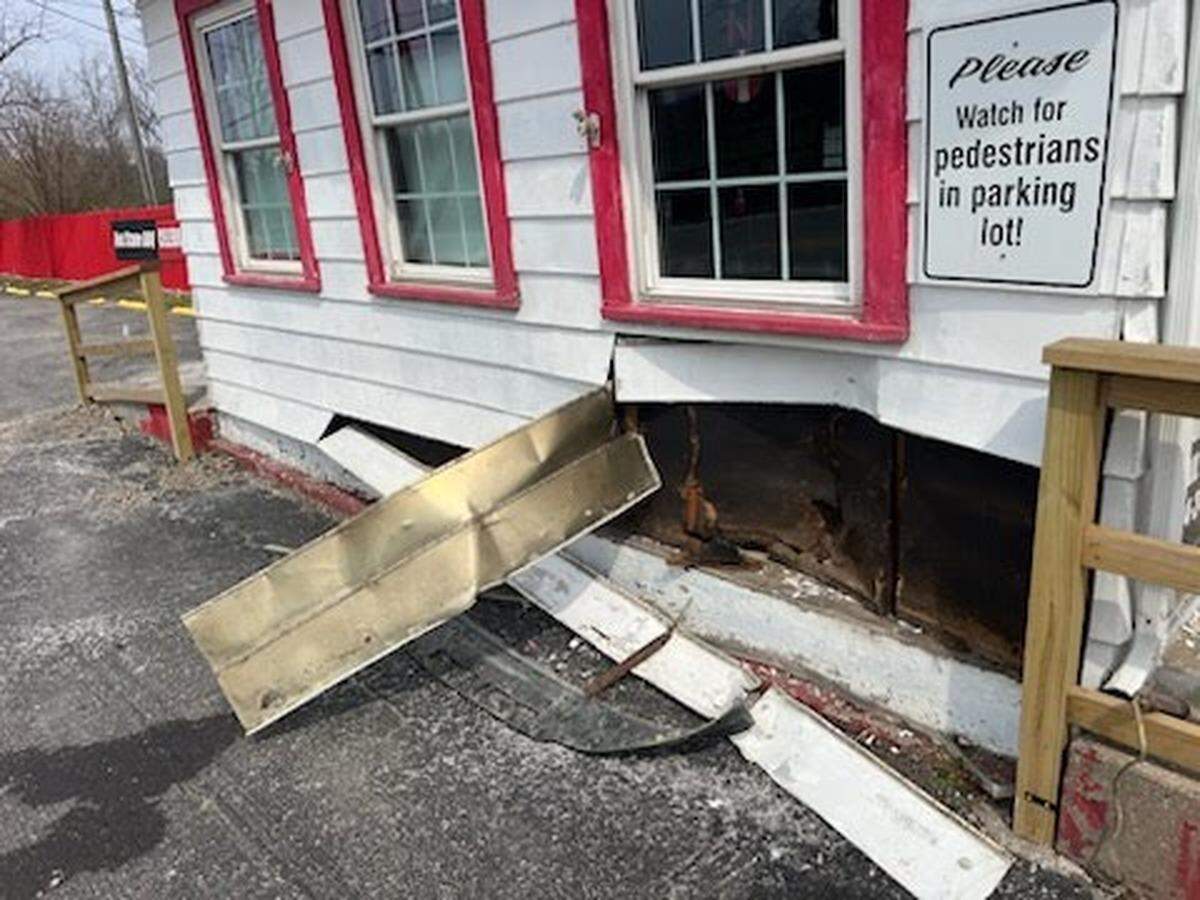The wall of Red State BBQ on Georgetown Road in Lexington was damaged March 20 after a car was struck then pushed backward into the building. The restaurant will be closed over the weekend and hopes to reopen early next week, according to owner David Carroll.