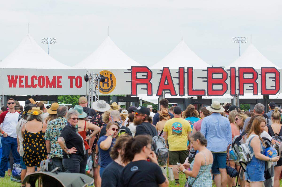 Festival goers lineup to enter Railbird at Red Mile June 1. This is the fourth rendition of Railbird, and the second time the festival was at Red Mile with 2019 and 2022 held at Keeneland. 