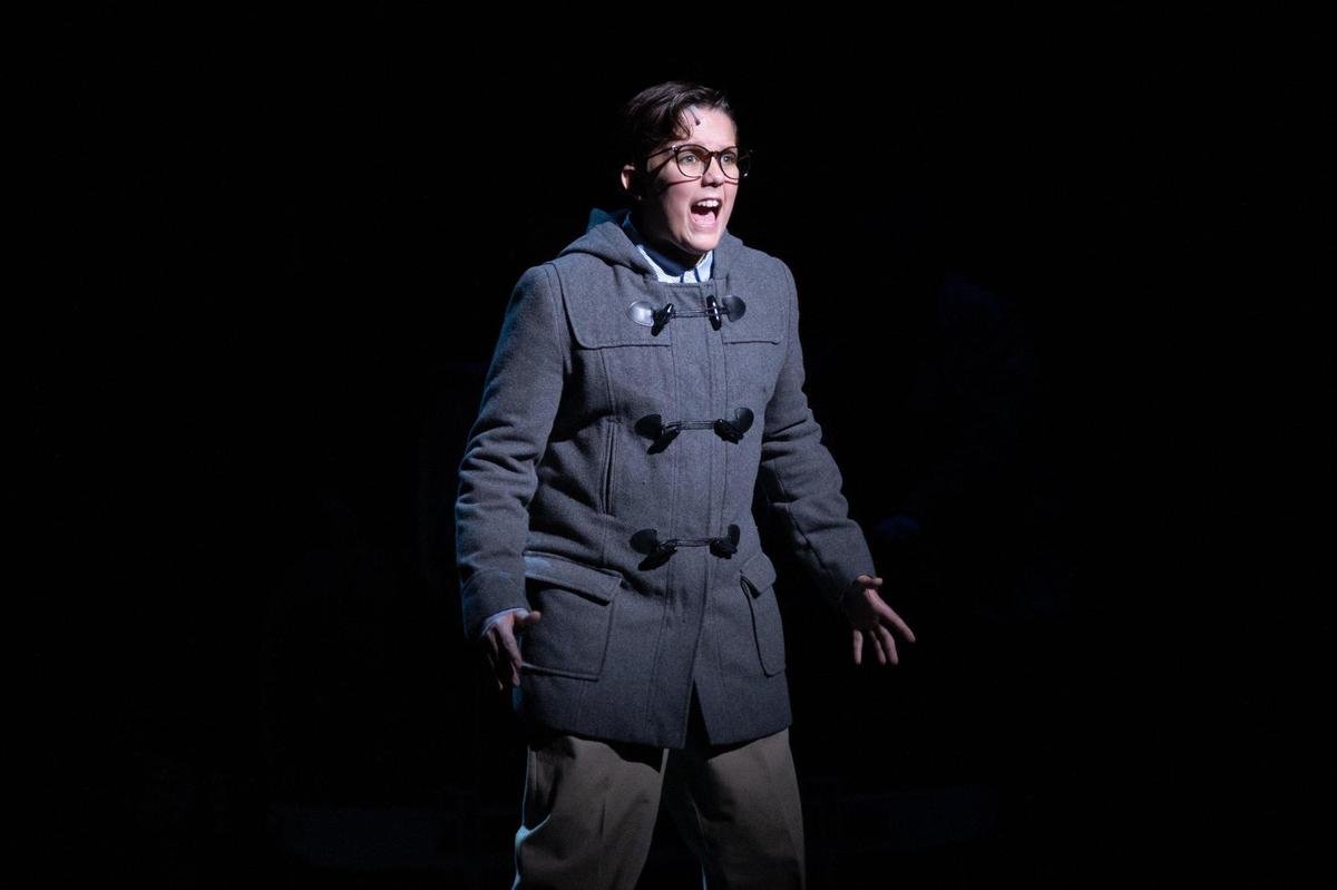 Henry Walter sings as the Ralphie during the The Lexington Theatre Company’s rehearsal of “A Christmas Story” at Lexington Opera House, November 18, 2024.