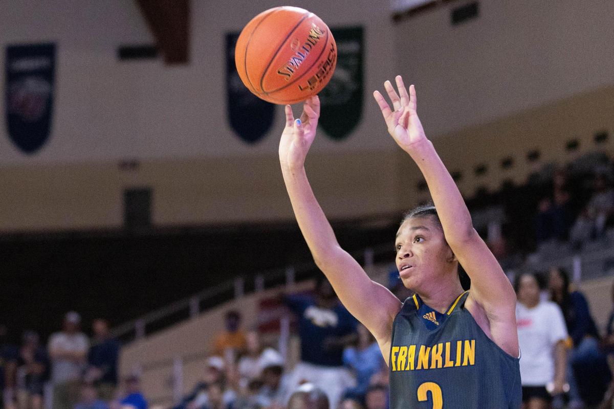 Franklin County freshman Leia Hogan shot a three-pointer during the Flyers’ 41-29 win over Lafayette in the girls’ 11th Region championship game.