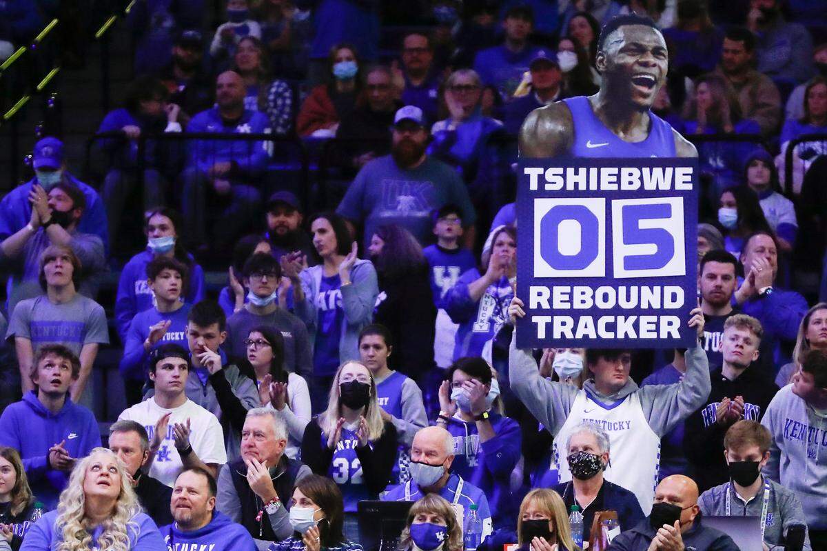 A Kentucky Wildcats fan holds an Oscar Tshiebwe (34) rebound tracker during a game against the North Florida Ospreys at Rupp Arena in Lexington, Ky., Friday, Nov. 26, 2021.