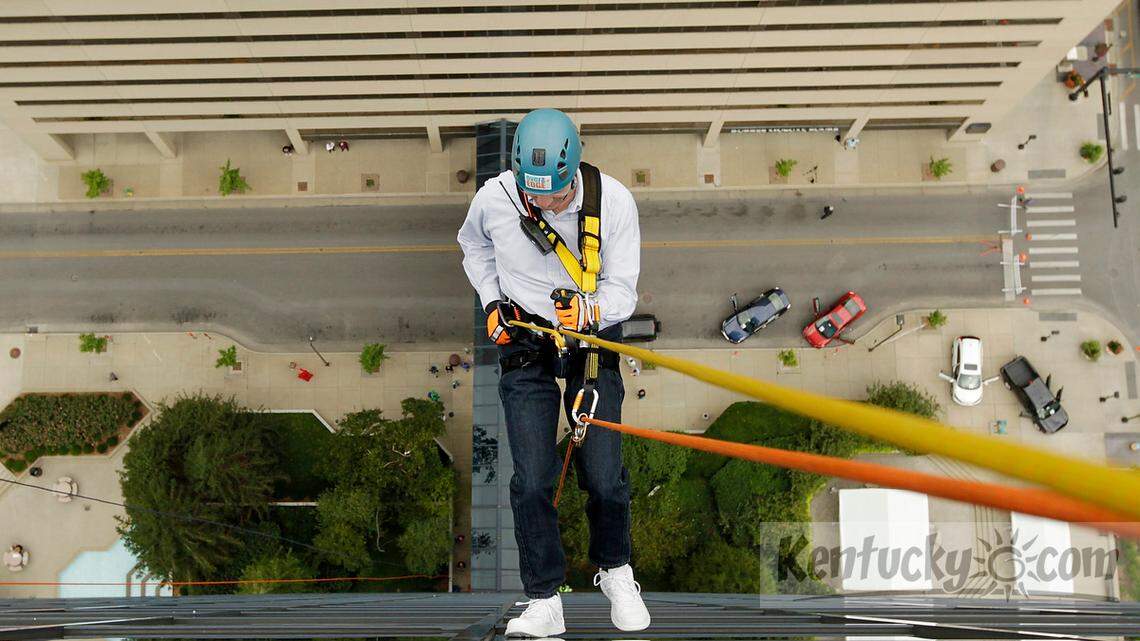 Herald-Leader columnist Tom Eblen rappelled down the side of the Lexington Financial Center on Sept. 25, 2013 during Brave the Blue, a fundraiser for the Boy Scouts’ Bluegrass Council.