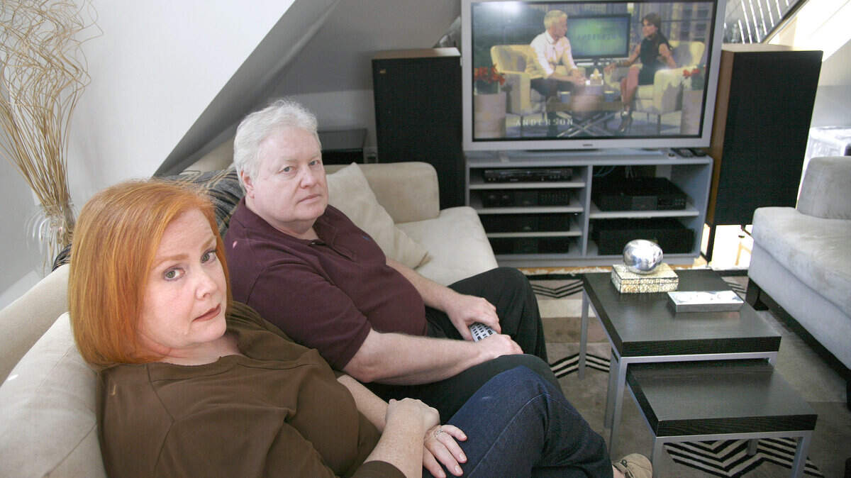 Susan and Bill Hardy of Lexington have the TV in their living room that is at the heart of a lawsuit brought by Dermot and Hilary Halpin, who said it was defective when they bought it from Bill Hardy's electronics store in 2002. The Hardys say it works just fine.  