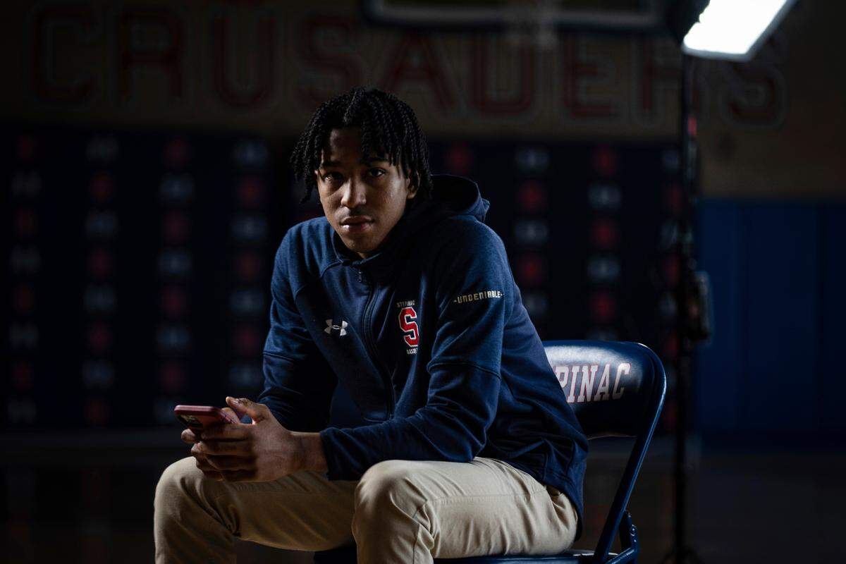 Johnuel “Boogie” Fland poses for a portrait on the basketball court at Archbishop Stepinac High School in White Plains, N.Y. Fland told the Herald-Leader that name, image and likeness monetary opportunities in college have leveled the playing field against alternative basketball pathways like the G-League Ignite and Overtime Elite.