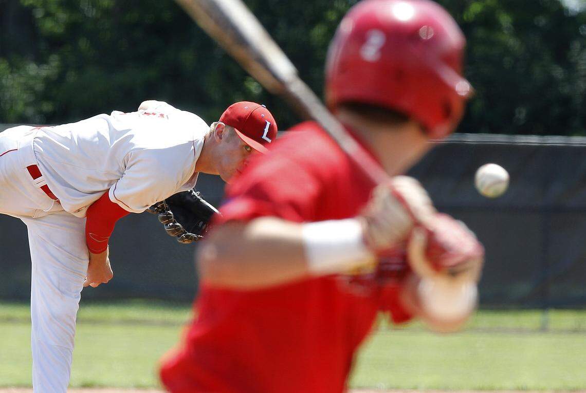 Tyler Guilfoil pitches for Lafayette against Scott County in the 11th Region Tournament semifinals in 2018.