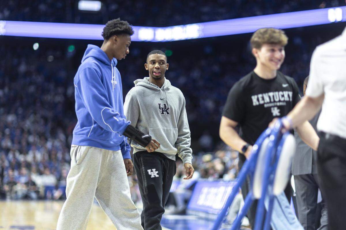 Jaxson Robinson, left, has been sidelined with a wrist injury, and Lamont Butler injured his left shoulder last month.