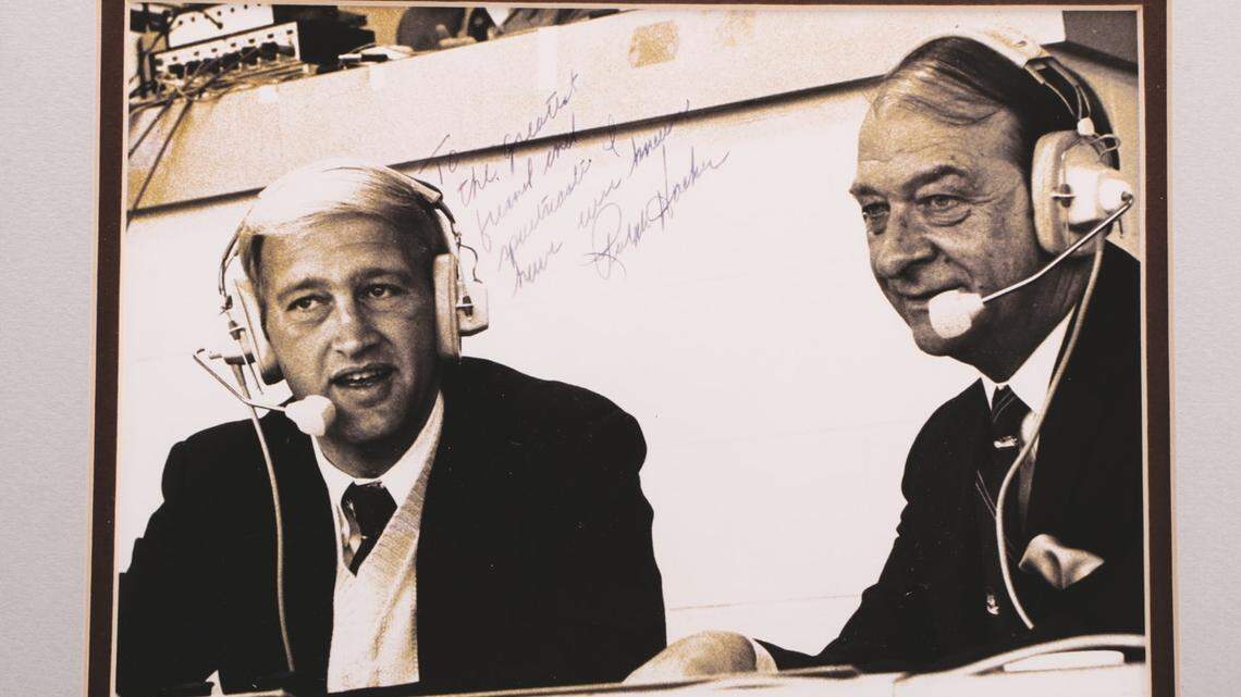 Among the pieces up for auction from the Ledford estate is a signed photo of announcers Ralph Hacker and Cawood Ledford. Hacker's signature reads: “To the greatest friend and sportscaster I have ever known.”