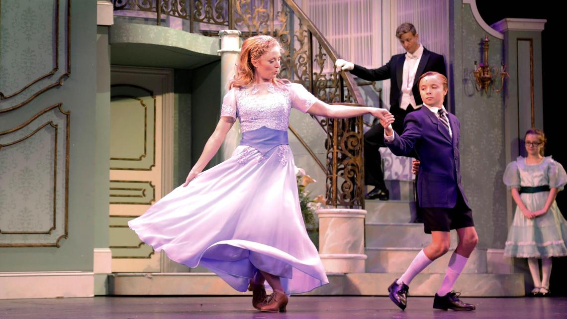 From left, Hayley Podschun dances with Reilly Dalton on Wednesday, July 11, 2023, at the Lexington Opera House production of “The Sound of Music.”
