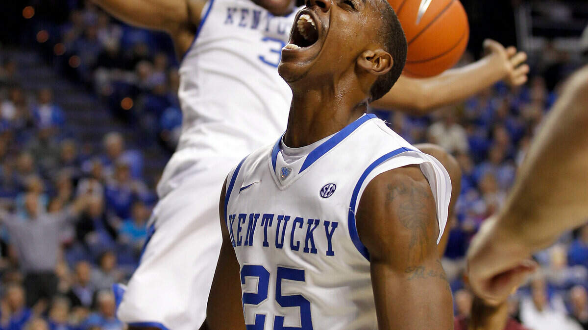 UK's 25-Marquis Teague reacted to Terrence Jones' dunk as the University of Kentucky played Morehouse College in Rupp Arena in Lexington, Ky., Monday, November, 07, 2011. This is first half action. Charles Bertram | Staff
