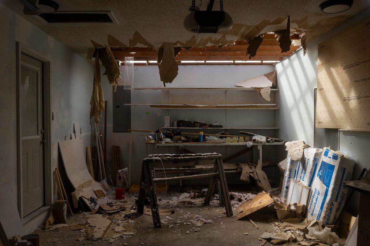 Light shines through the roof into the garage on Sunday, May 18, 2025, at the Colier house off U.S. Route 27 in Somerset, Ky.
