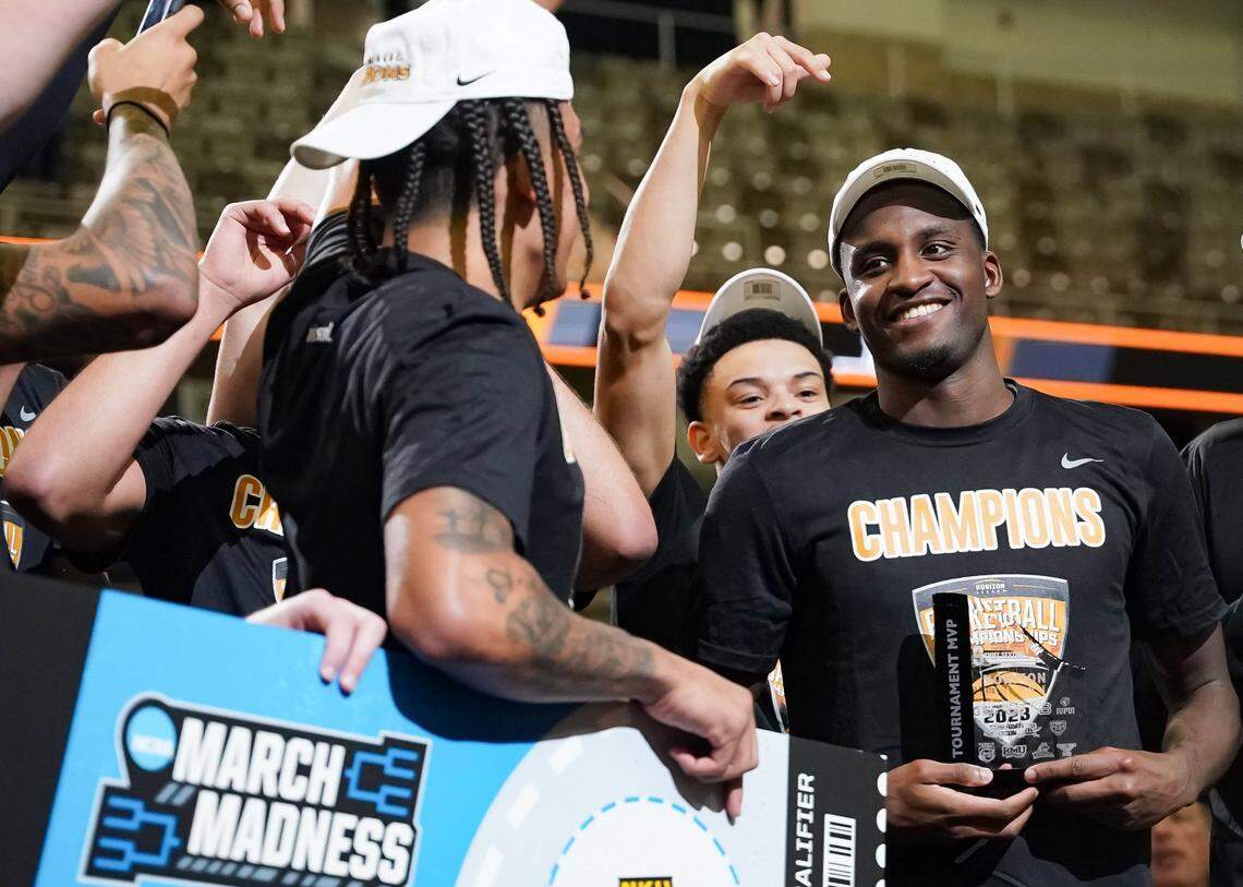 Marques Warrick celebrates with his teammates after being named MVP of the Horizon League Tournament while playing for Northern Kentucky in 2023.