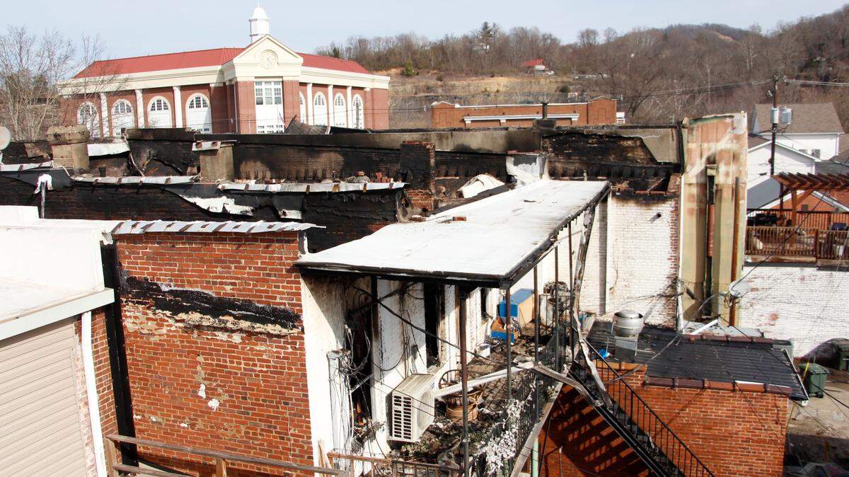 At least six buildings and several more businesses were partially or totally destroyed by the blaze in downtown Williamsburg on Tuesday, Jan. 20, 2026. One person sustained minor smoke inhalation injuries and a firefighter was injured on their foot.