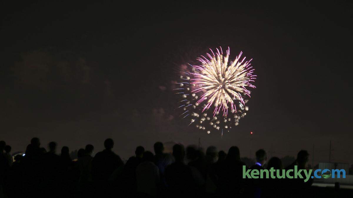 Crowds gathered at the top of a parking garage off South Limestone to view the Fourth of July fireworks Saturday in downtown Lexington.
