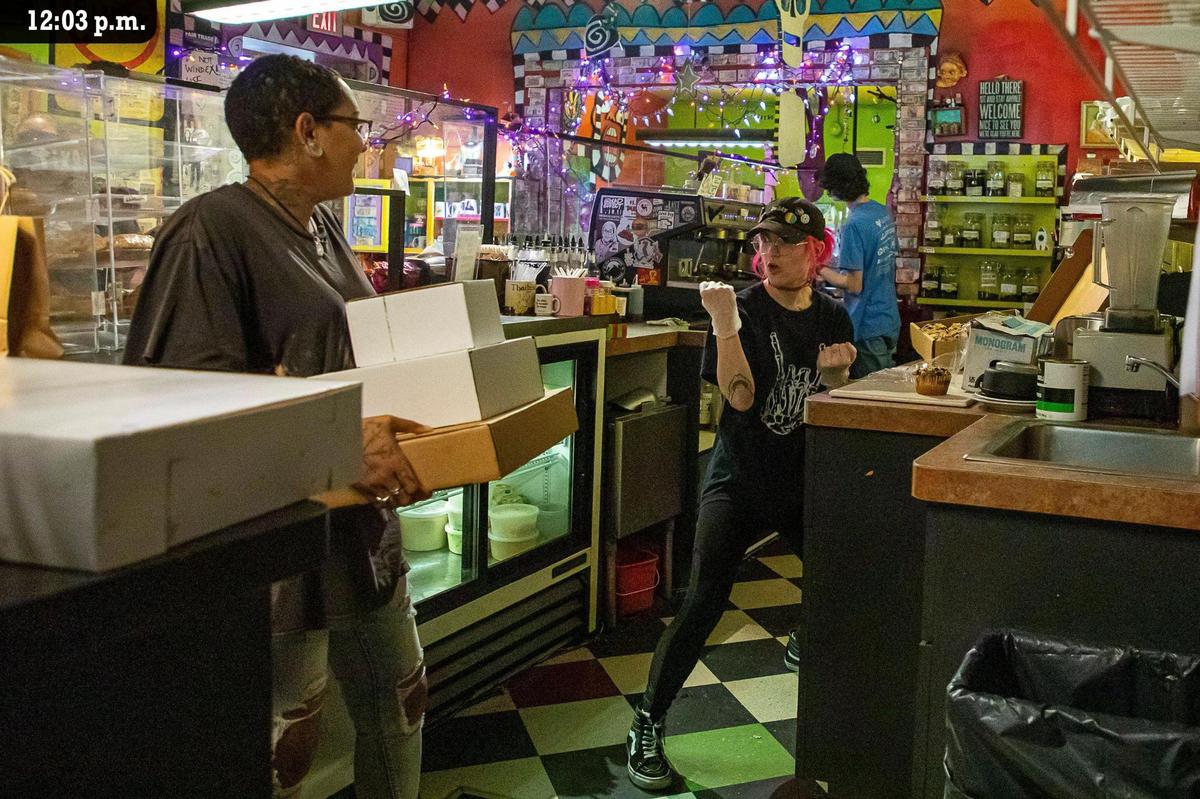 Brittany Bruce jokes with her co-worker Artemis Luna while packaging muffins during a lull at Third Street Stuff and Coffee Friday, July 9. “You should see us during happy hour,” said Bruce, referring to one of their busiest times of the day. Third Street Stuff and Coffee’s happy hour is at 5 p.m. everyday, when they offer half off drinks.