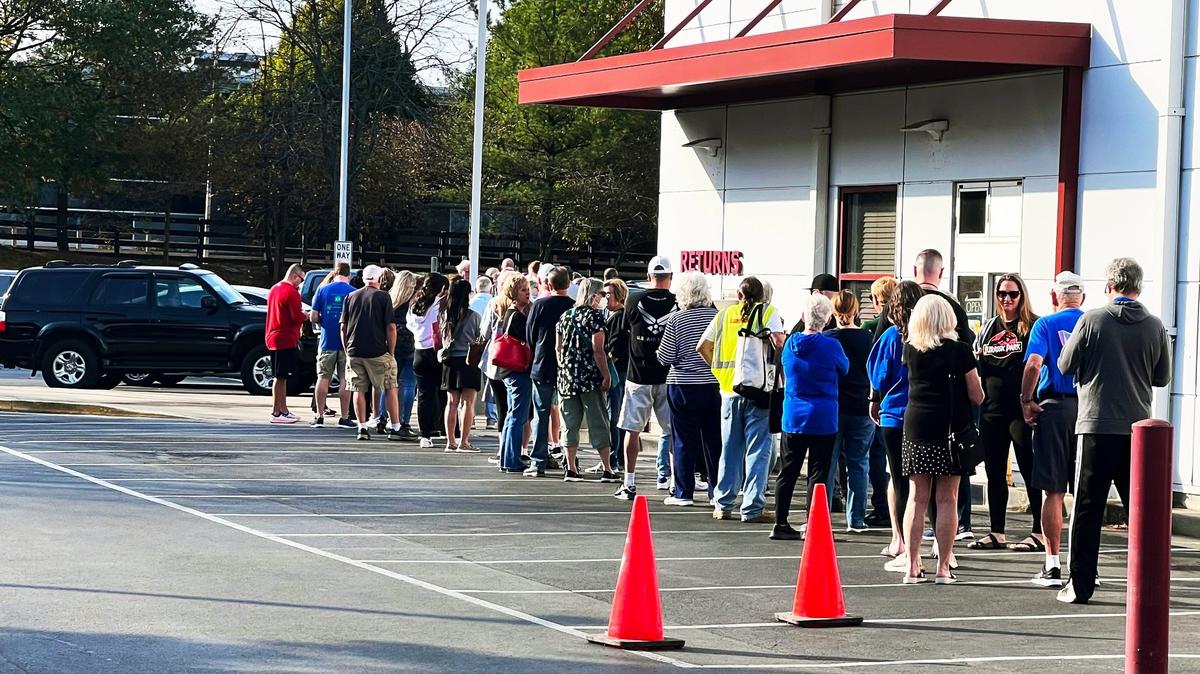 Early voting lines wrapped around the Eastside Branch Public Library in Lexington, KY, causing voting poll workers to loop citizens around the rear of the building as early as 7:30 a.m. on October 31, 2024.