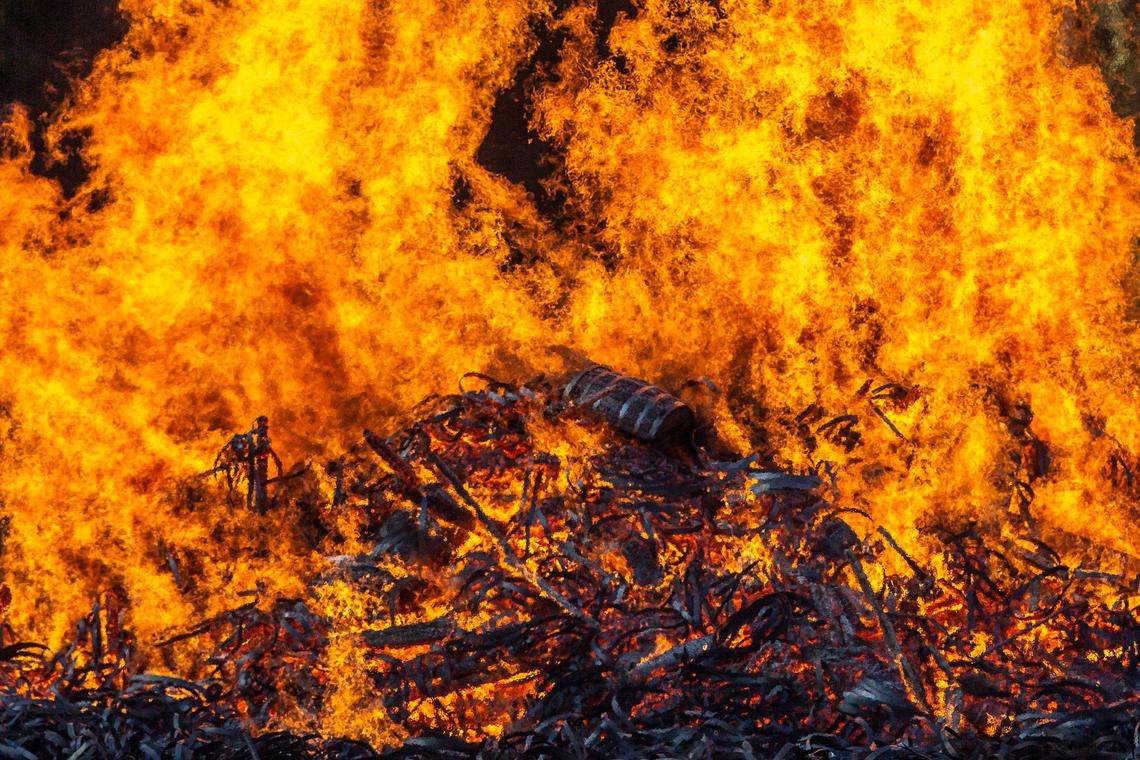 A Jim Beam bourbon warehouse in Woodford County, Ky., burns on Wednesday, July 3, 2019, after catching fire late Tuesday night.