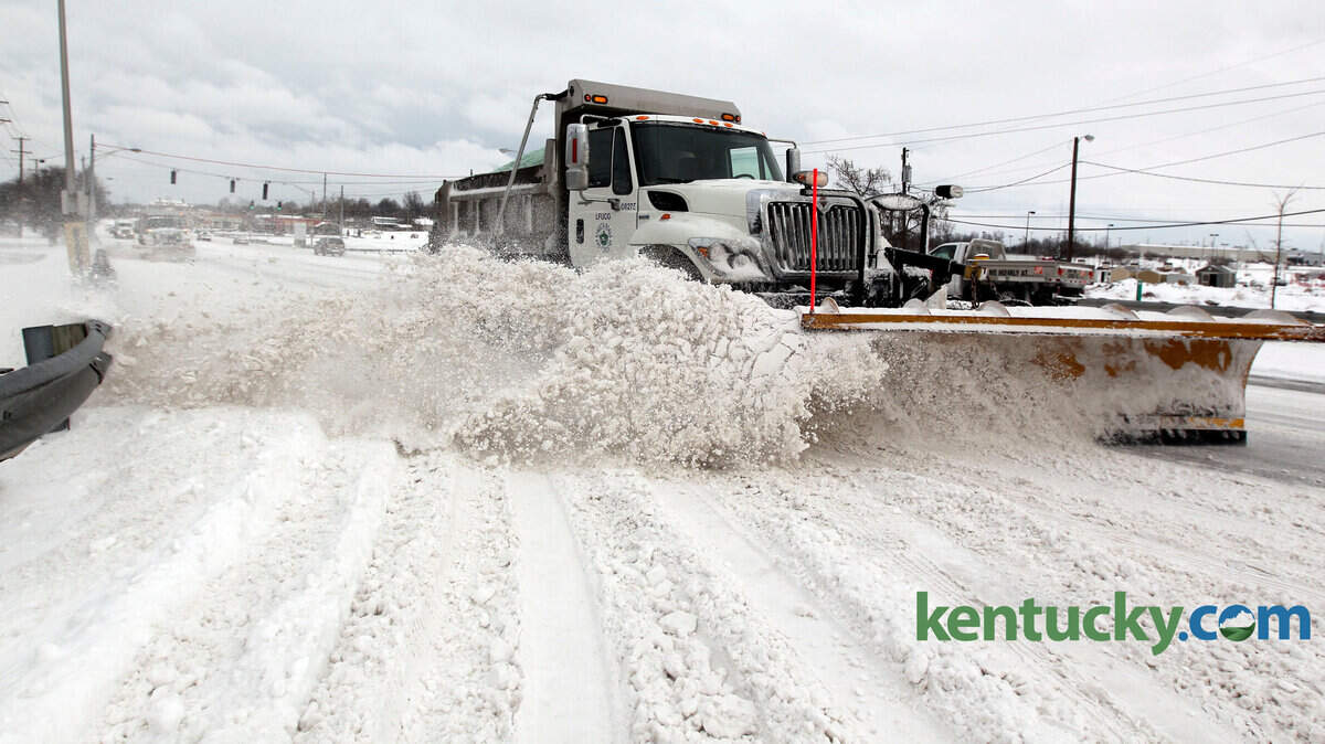 A city snowplow cleared a lane Monday morning on Richmond Road near New Circle Road in Lexington.