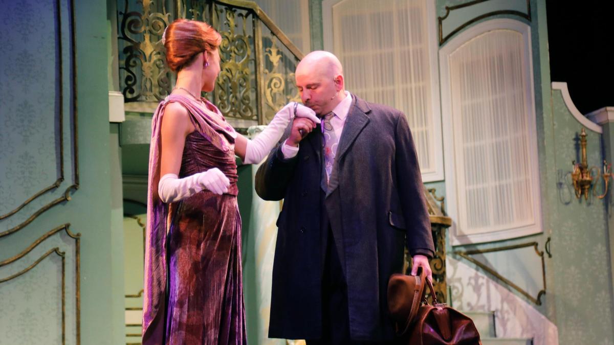 From left, Taylor Tveten watches as Brance Cornelius kisses her hand on Wednesday, July 11, 2023 at the Lexington Opera House in Lexington, Ky.