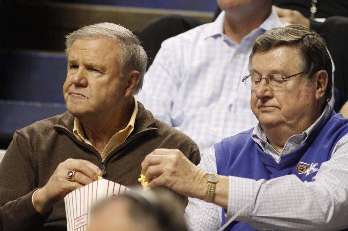 Eight years after the original Herald-Leader photograph of Denny Crum and Joe B. Hall sharing popcorn in Rupp Arena, photographer David Perry captured the duo doing the same thing during a quarterfinals game between Southwestern and Rowan County in the 2012 Boys’ Sweet Sixteen.