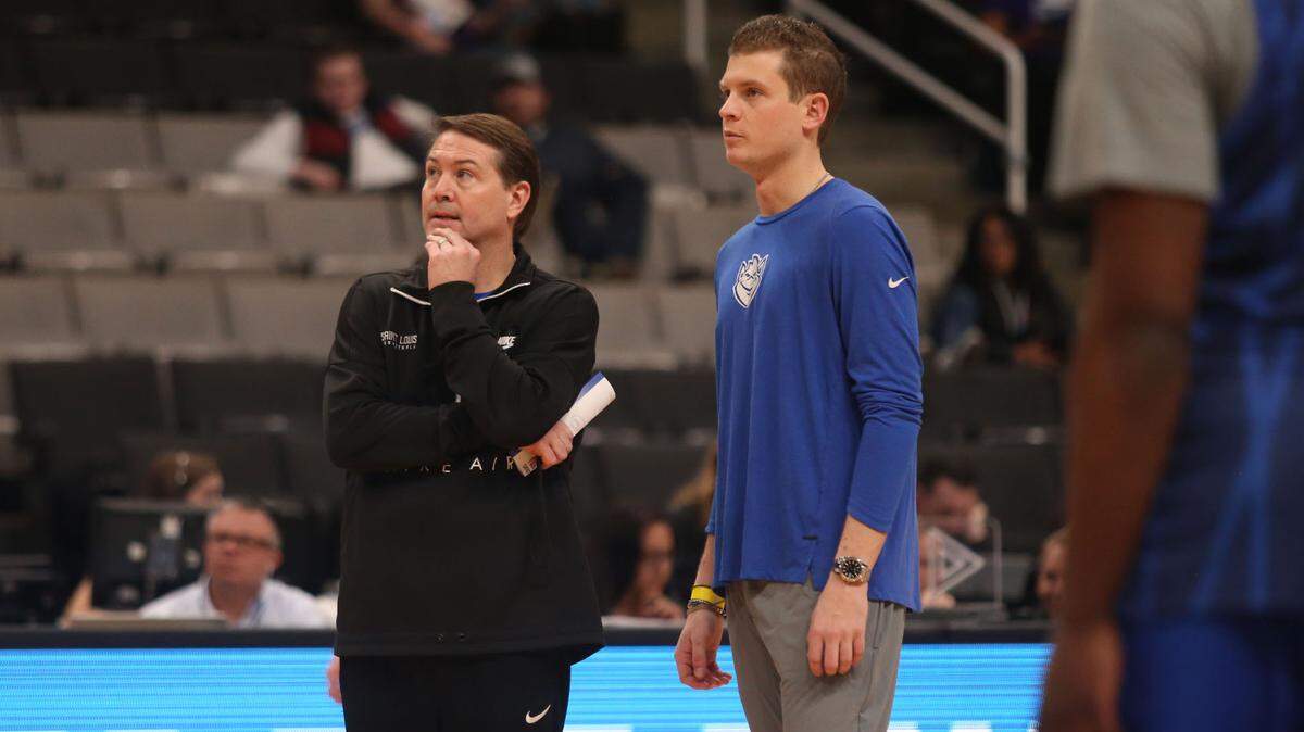 Saint Louis University men’s basketball coach Travis Ford, stood with his nephew and assistant coach Ford Stuen as the Billikens practiced before playing in the 2019 NCAA Tournament. Stuen, 29, died May 11 after coming down with what Travis Ford says is an undetermined illness.