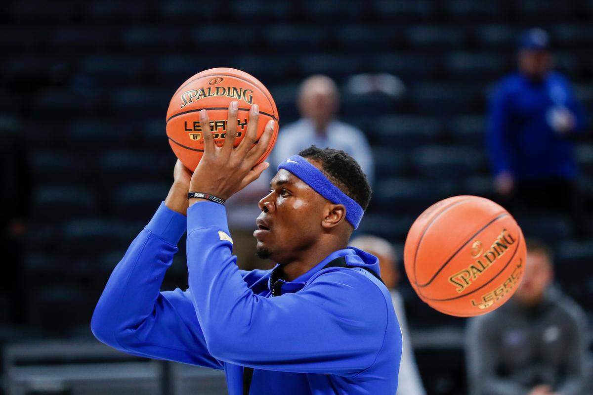 Oscar Tshiebwe practices shooting the ball prior to the game against Michigan State at Gainbridge Fieldhouse in Indianapolis, In., Tuesday, November 15, 2022.