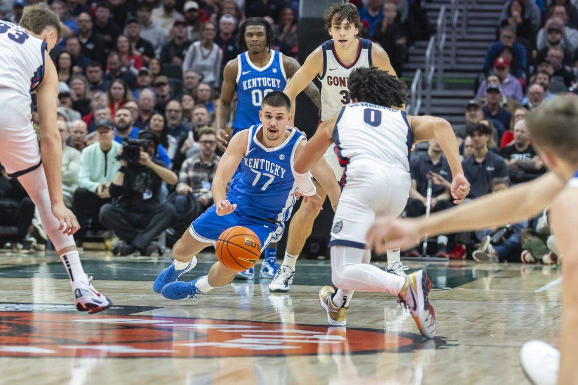 Kerr Kriisa (77) started at point guard for Kentucky against Gonzaga on Saturday night because regular starter Lamont Butler sat out with an injury.