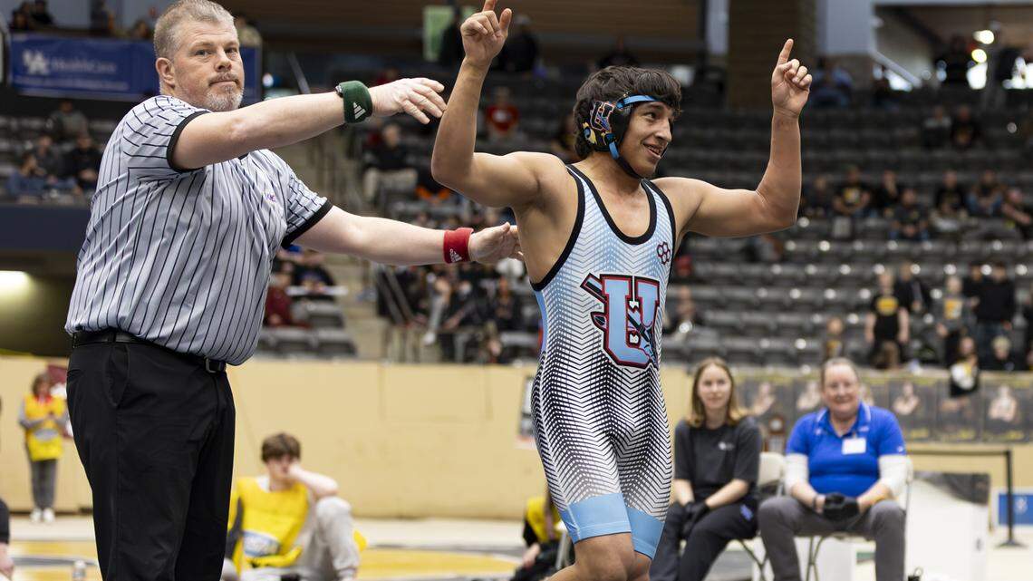 Union County’s Jayden Raney celebrated his pinfall win in the 144-pound finals of the 2026 KHSAA Boys/Co-ed State Wrestling Championships at the Kentucky Horse Park’s Alltech Arena on Friday.