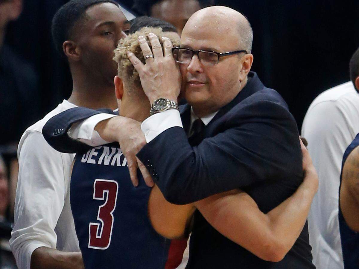 Fairleigh Dickinson Coach Greg Herenda hugged Jahlil Jenkins as he left the court during FDU’s loss to Gonzaga during last season’s NCAA Tournament.