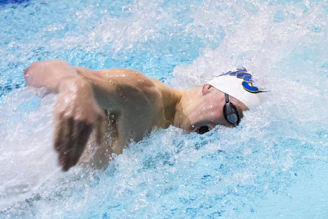 Henry Clay’s Nick Johnson competes in the 100 freestyle during the 2025 KHSAA State Swimming and Diving Championships at the University of Kentucky’s Lancaster Aquatic Center on Friday.