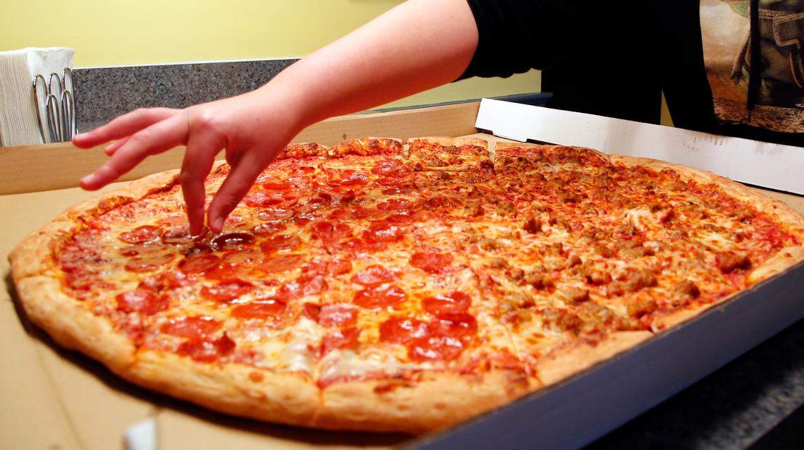 The 28-inch Big Bambino pizza with sausage and pepperoni from Lexington’s Big City Pizza is seen in this Jan. 10, 2021, photo.