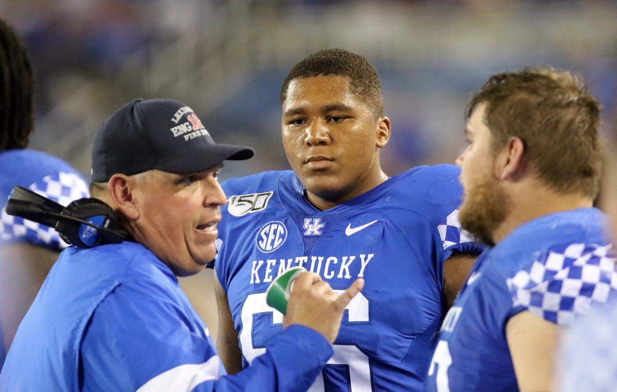 Mark Stoops singled out both Kentucky left tackle Naasir Watkins (66) and center Drake Jackson (52) for playing well in UK’s 24-20 win over Arkansas last week.