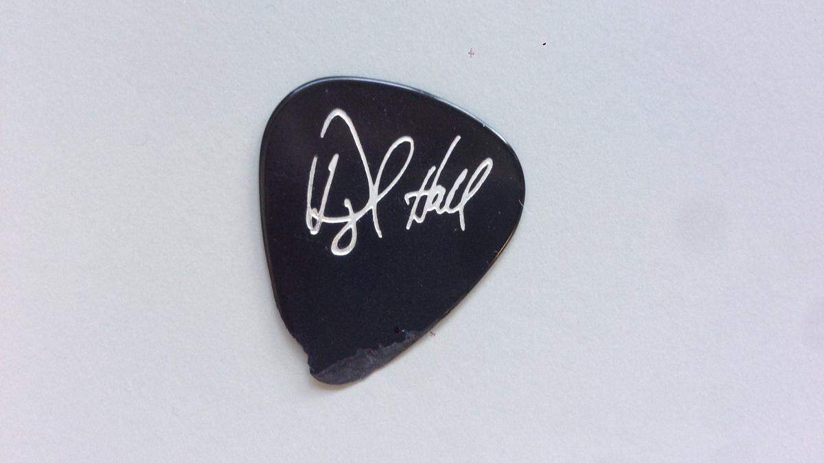 Daryl Hall gave Dorothea Wingo's husband, Paul, his guitar pick during a Hall & Oates concert on May 11, 2014, at the PNC Pavilion in Cincinnati.