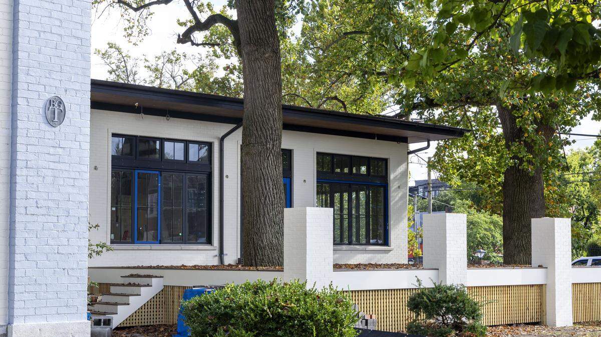 The building addition to Millstone, the new restaurant and bar inside historic Dudley Square, includes a new patio, photographed Thursday, Sept. 26, 2025, in Lexington, Ky. The outdoor dining area is shaded by two large tulip poplar trees, one of which the deck was built around. “It's gonna be something really special,” owner Tyler Murray said.