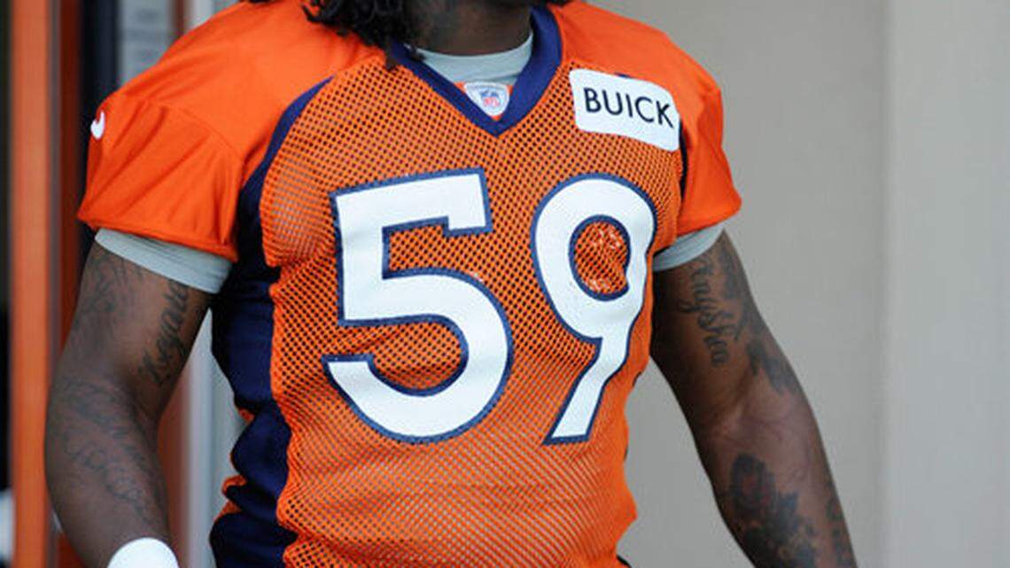 Denver Broncos line backer Danny Trevathan walked onto the field during training camp on July 26, 2013, in Englewood, Colo. AP Photo/Jack Dempsey