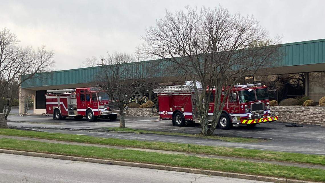 Fire trucks sit outside 340 Legion Drive in Lexington, Ky.