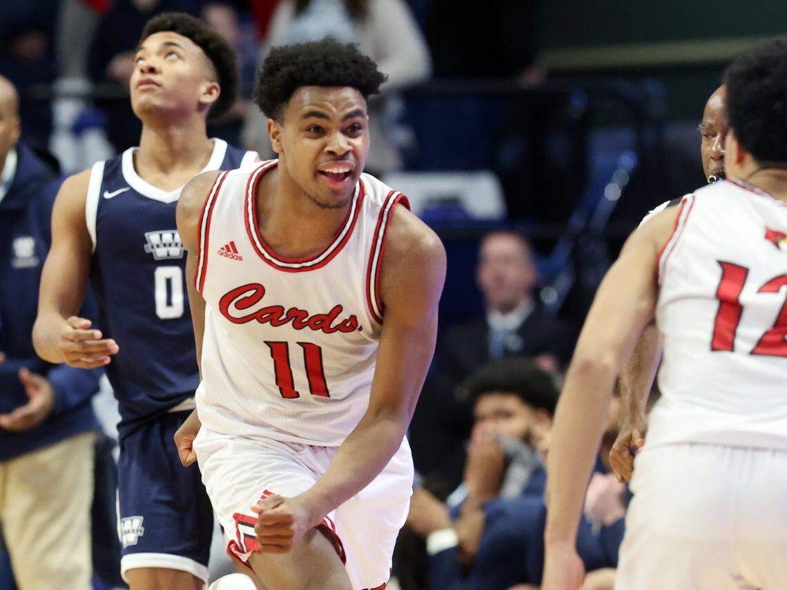 Clark County’s Jerone Morton (11) celebrates after the Cardinals won the Sweet 16 championship at Rupp Arena on March 19.