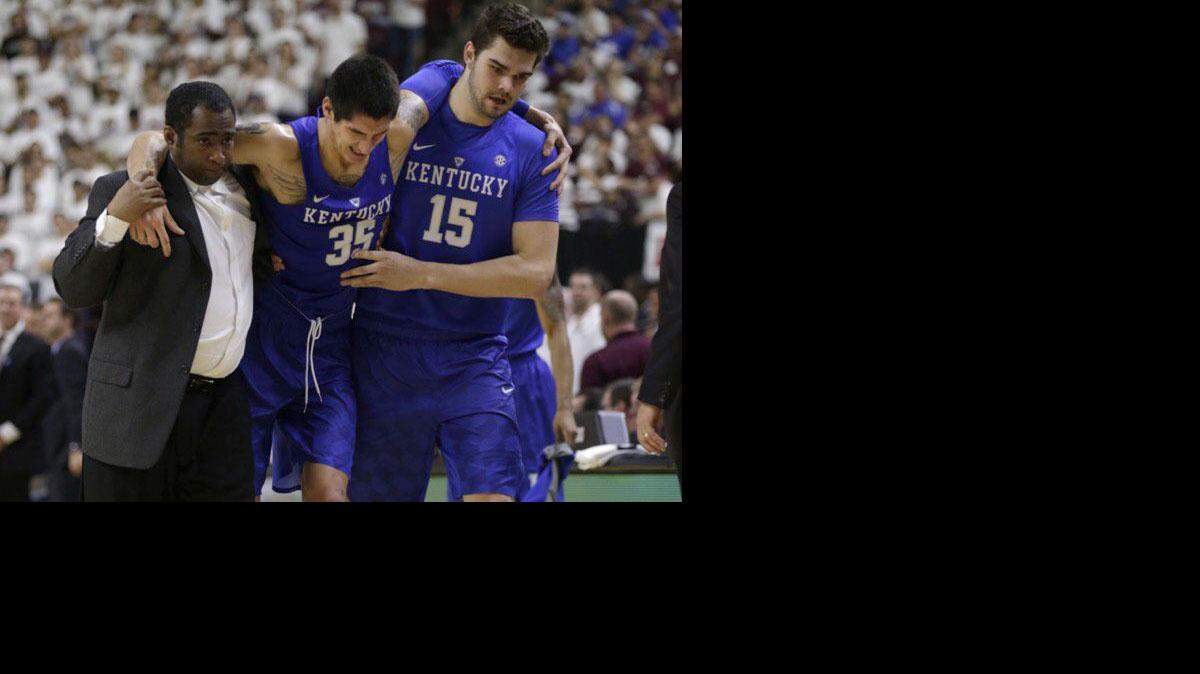 Derek Willis was helped off the court with an ankle injury during the second half against Texas A&M on Feb. 20, 2016.
