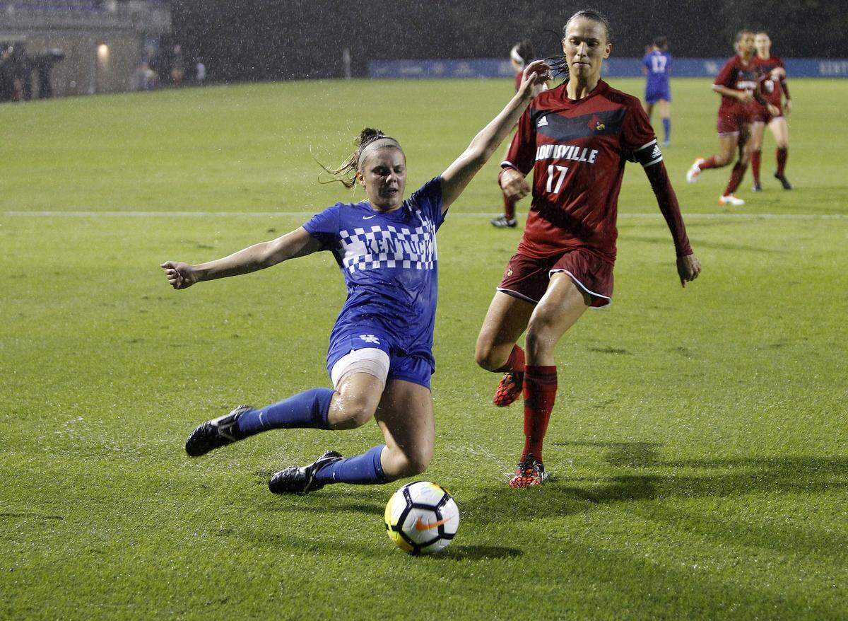 Kentucky’s Foster Ignoffo shot on goal against Louisville’s Inger Katrine Bjerke in U of L’s 3-1 win at UK in 2017. A scheduling impasse means the Cats and Cards will not face each other in women’s soccer in the current school year.