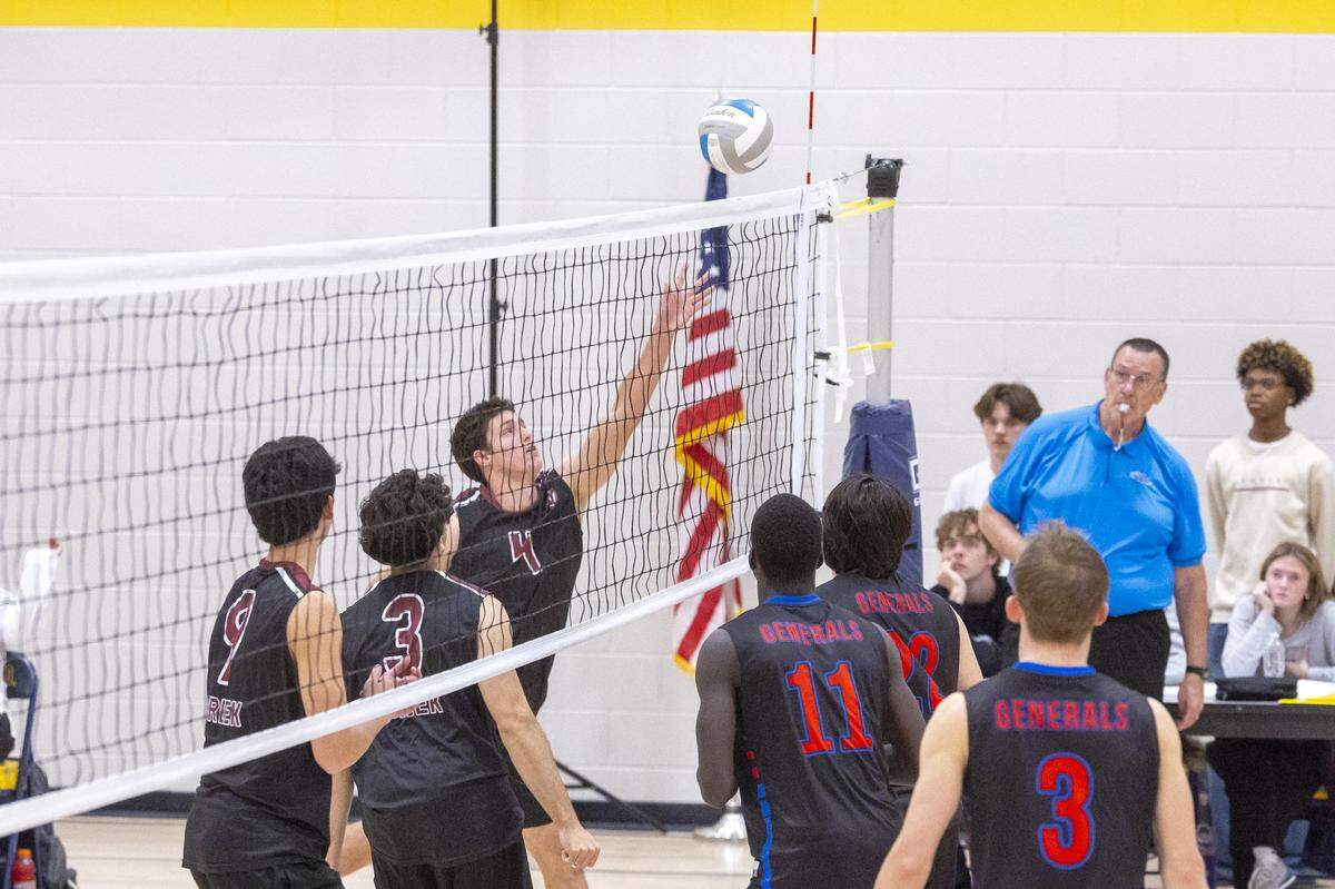 Tates Creek's Tom Haubenreich returns the ball during the Region 7 boys volleyball tournament semifinals at Franklin County High School in Frankfort, Ky., on Wednesday, May 6, 2026.