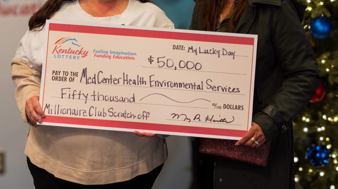 Kentucky supervisor buys team lottery tickets for Christmas — and group splits a big win