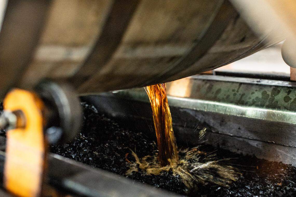 Bourbon was being dumped from a barrel before bottling. Two former Maker’s Mark bourbon makers are building a new distillery outside Bardstown in Washington County.