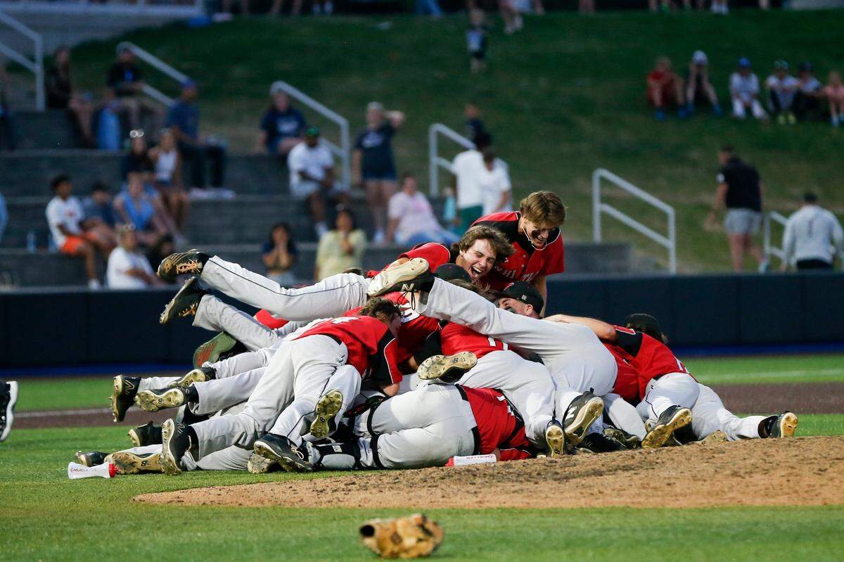 Whitley County celebrates earning its first baseball state championship with a 2-1 victory against Shelby County at Kentucky Proud Park on Saturday.