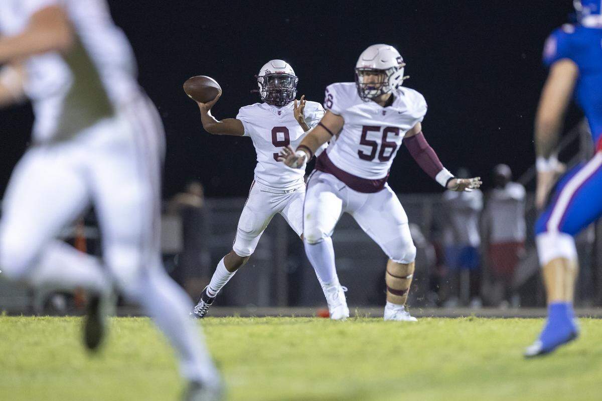 Tates Creek's Darnell Burnside Jr (9) looks to pass the ball during the Fort Harrod Bowl at Alvis Johnson Field in Harrodsburg, Ky., on Saturday, Aug. 23, 2025.